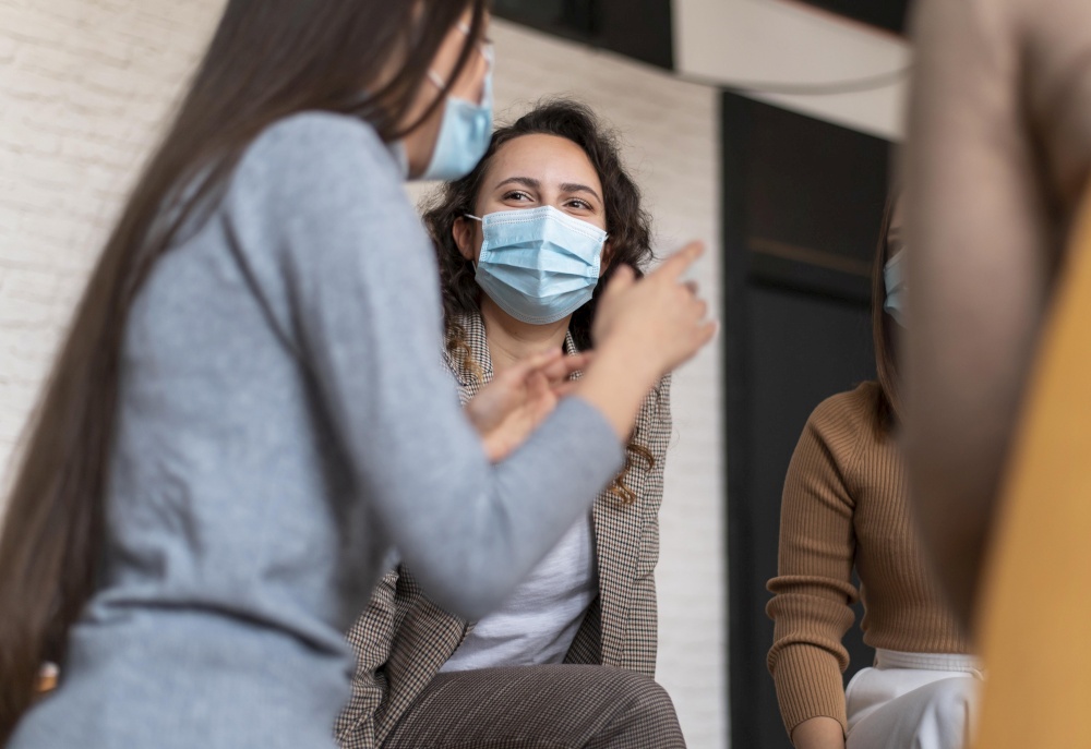 women wearing masks therapy