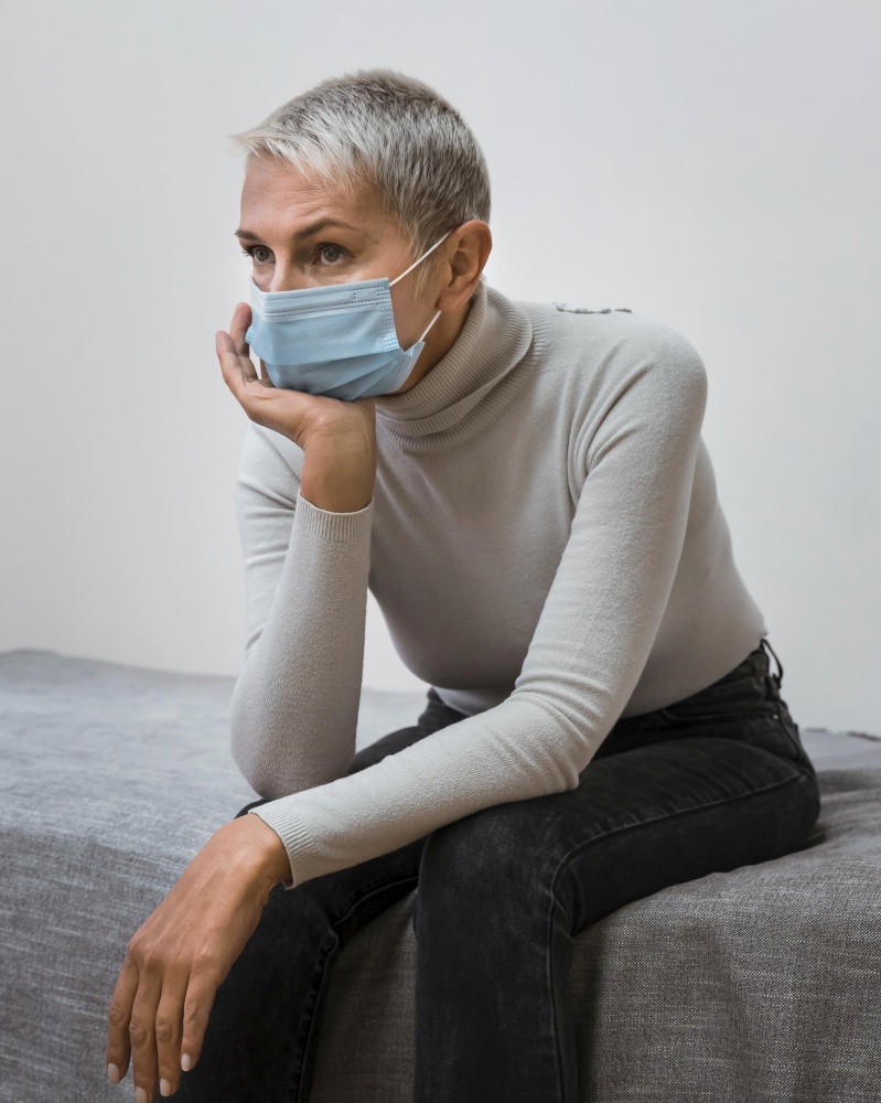 woman with face mask waiting doctor
