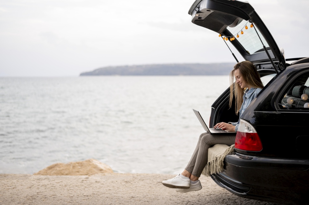 young woman enjoying road trip 16