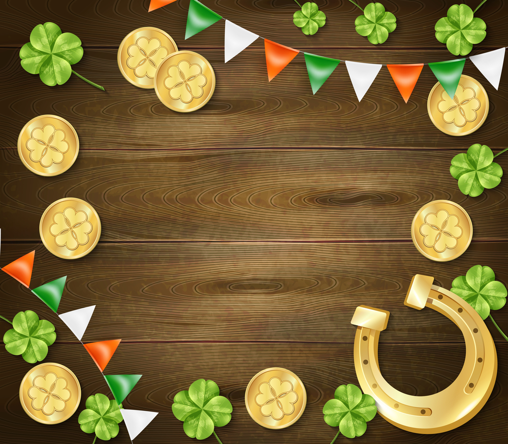 Saint patricks day frame on wooden background with golden horseshoe and coins, clover, colorful pennants vector illustration . Saint Patricks Day Wooden Background