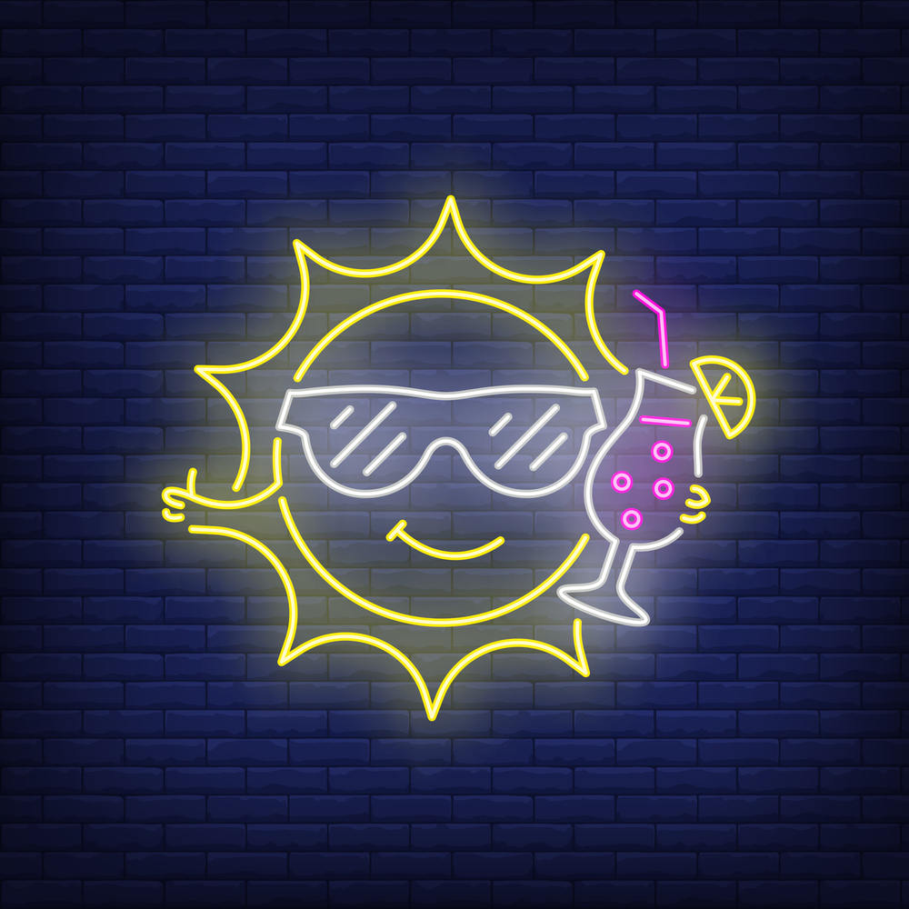 Cartoon sun drinking cocktail neon sign. Cute character with glass and straw on brick wall background. Vector illustration in neon style for party flyers or bar posters