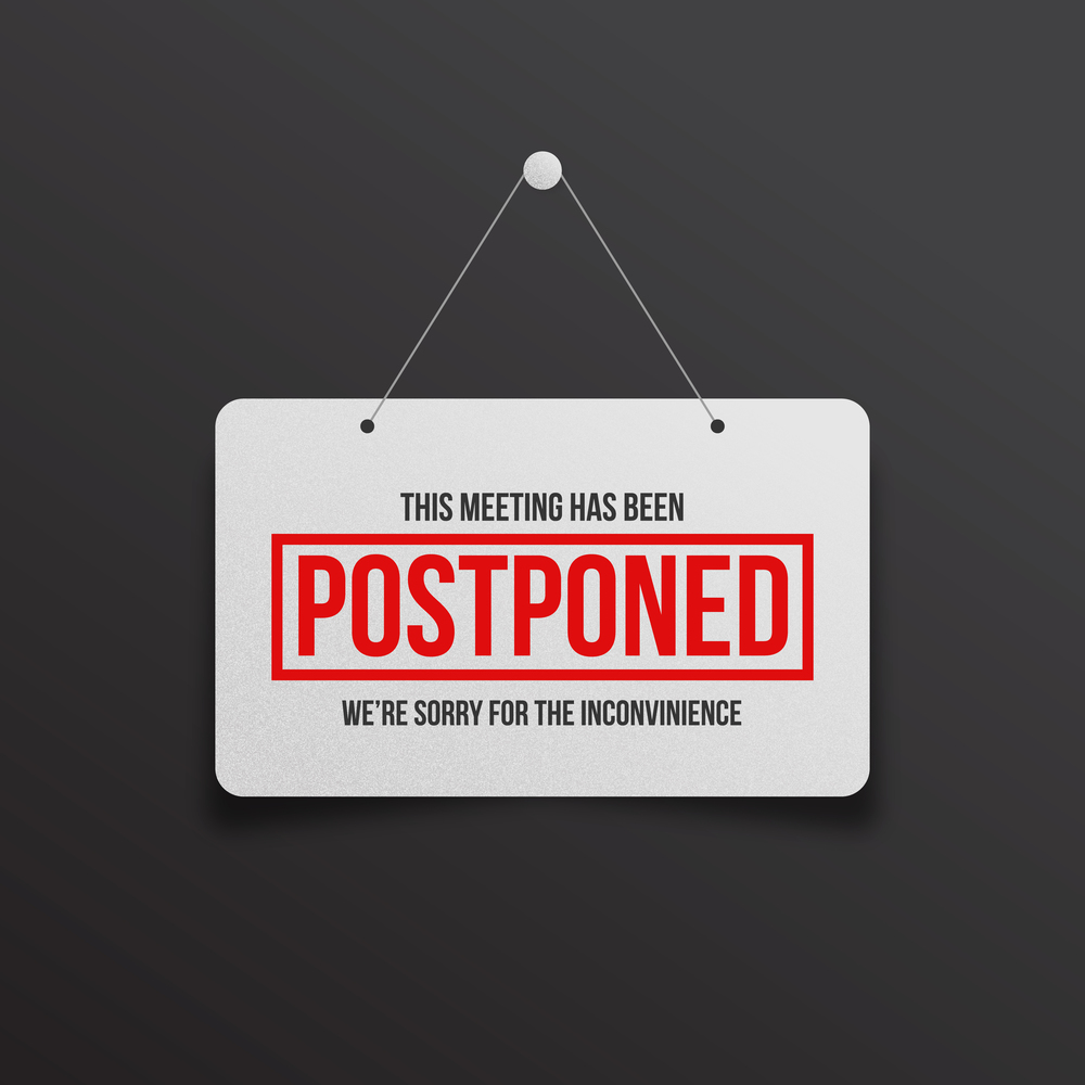 Postponed sign hanging