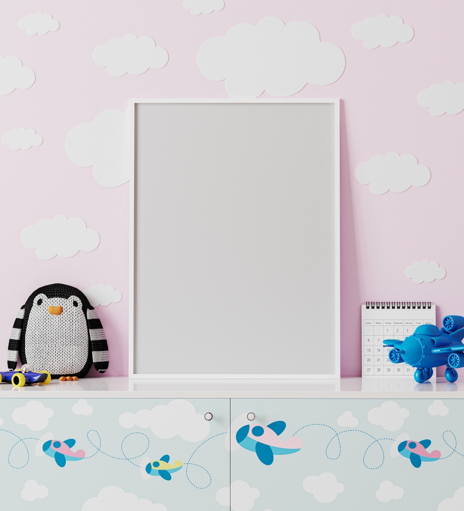poster frame mock up in children&rsquo;s room with pink wall with clouds, chest of drawers with planes print, penguin soft toy, plane toy, 3d rendering