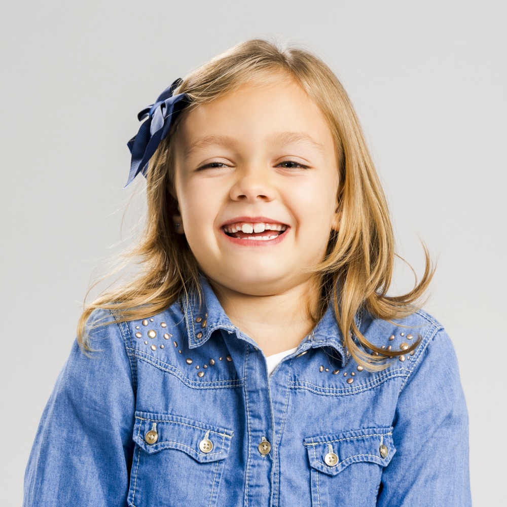 Portrait of a little girl with a smiling expression