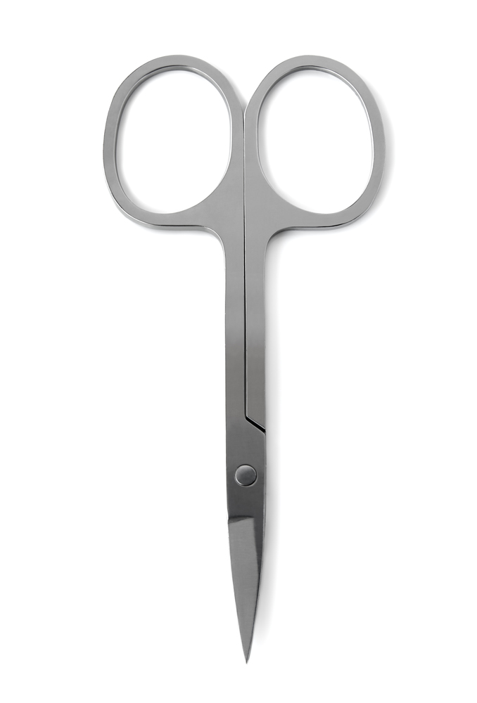 Overhead view of pair of nail scissors isloated on white background