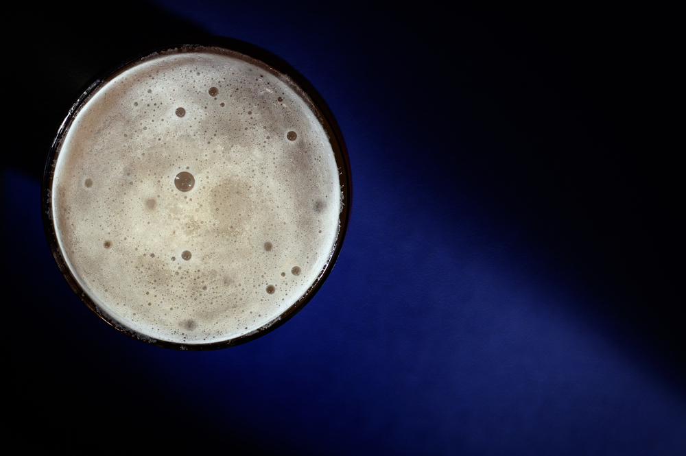 Concept with Moon from Pint Of Beer on Night