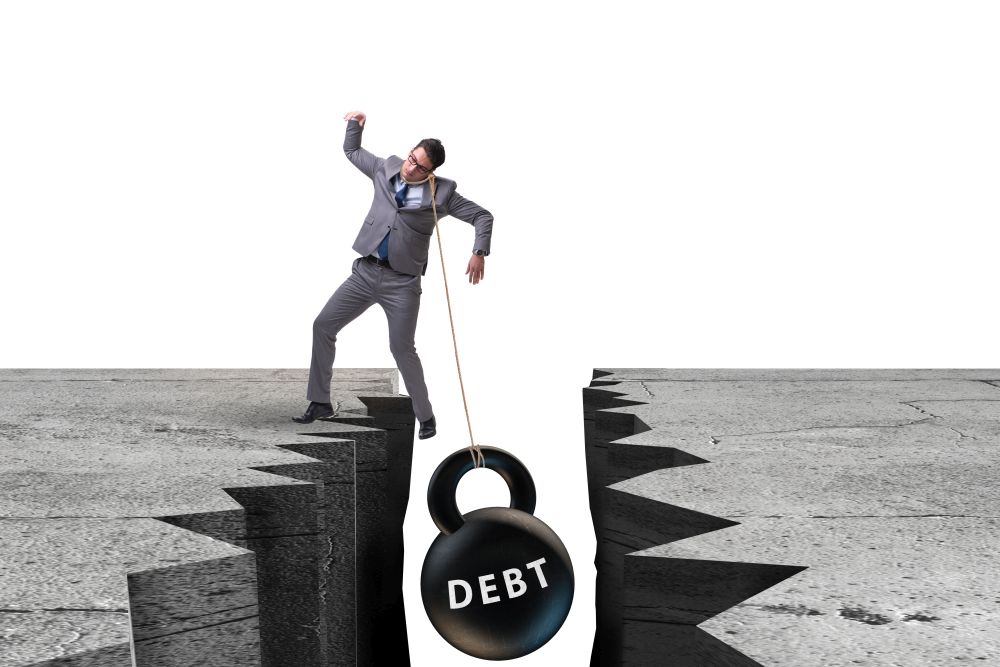 The concept of debt and load with businessman. Concept of debt and load with businessman