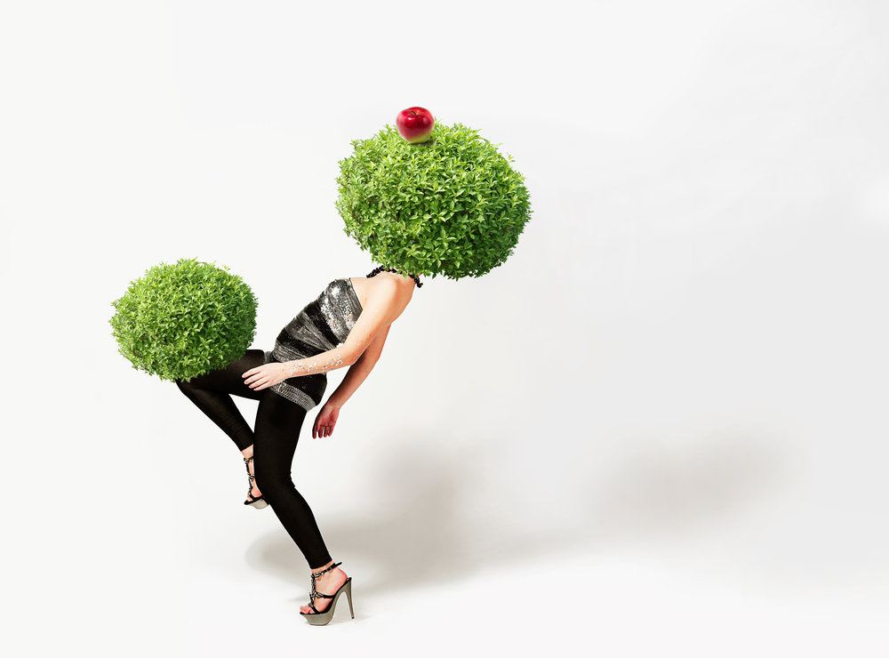 tree woman with red apple
