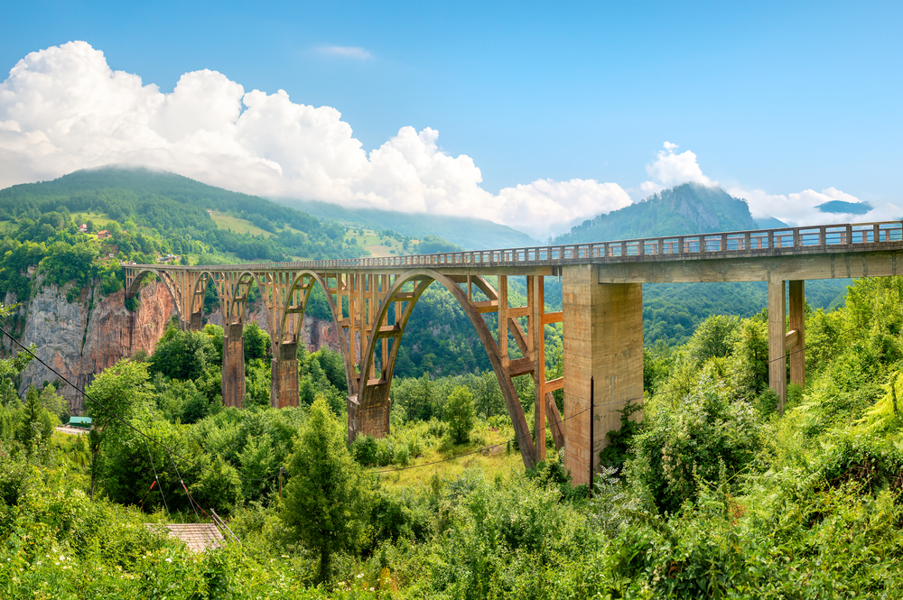 Montenegro. Dzhurdzhevich Bridge Over The River Tara. Bridge Over Tara