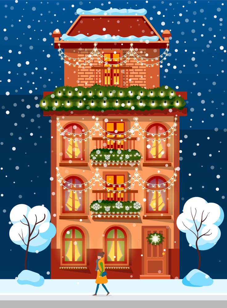Urban brick building, housing for people. Facade, front exterior on Christmas holiday, snowy trees near and Xmas decor. Festive decoration like garlands from fir branches and light lamps. Living Building with Winter Festive Decoration