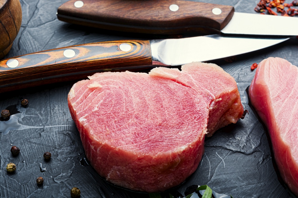 Raw tuna steak,fresh red tuna fillet.Close up,macro. Fresh tuna fish steak