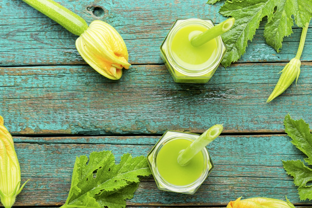 Green fresh raw smoothie from zucchini.Healthy beverage. Green detox smoothie
