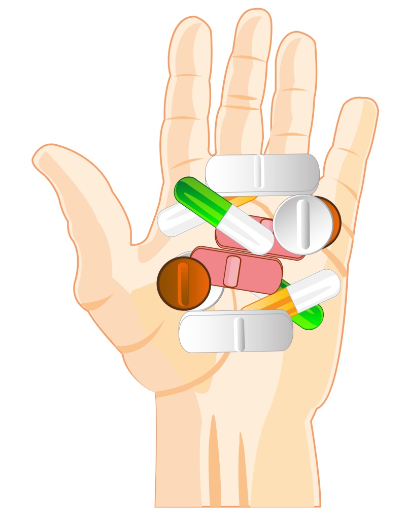 Medicine of the tablet and capsules on palm of the person. Much colour tablets on palm is insulated on white background