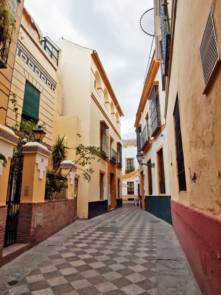 very narrow traditional spanish street. Sevilla, Andalusia. Spain
