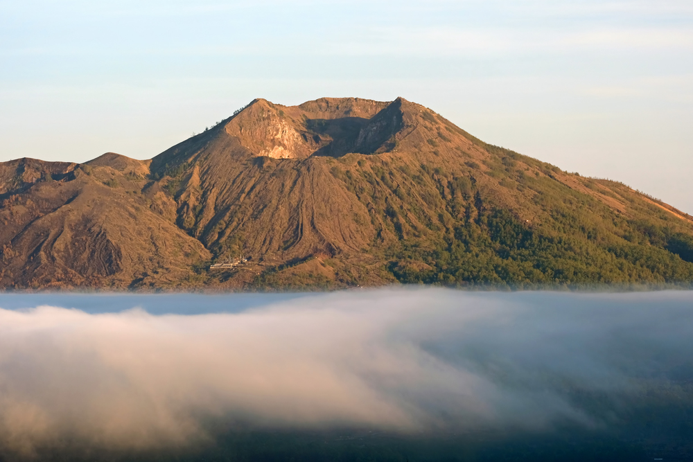 Mount Batur in the clouds at sunrise on Bali Indonesia