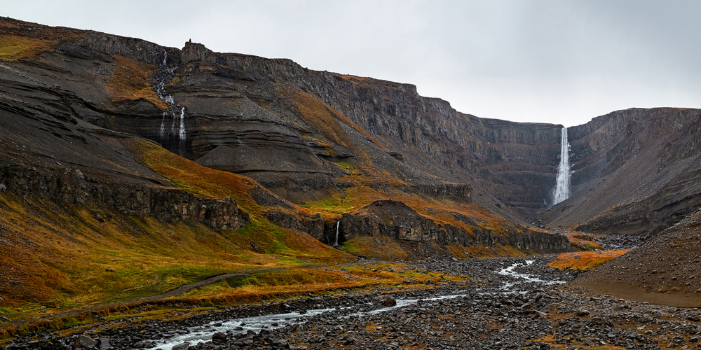 Hengifoss waterfall in eastside of Iceland in a cloudy day. Hengifoss waterfall, Iceland