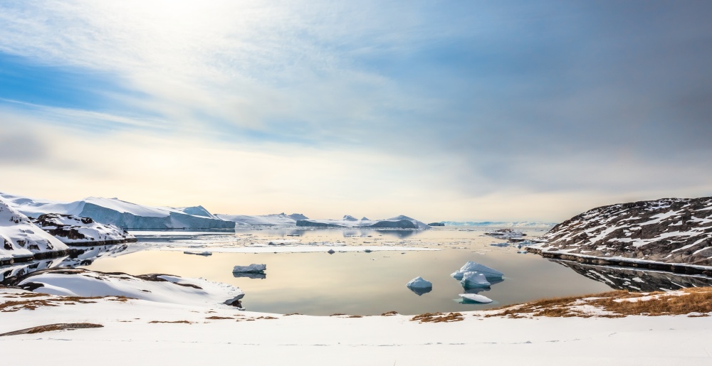 Ice fields and drifting Icebergs at the Ilulissat fjord, North Greenland