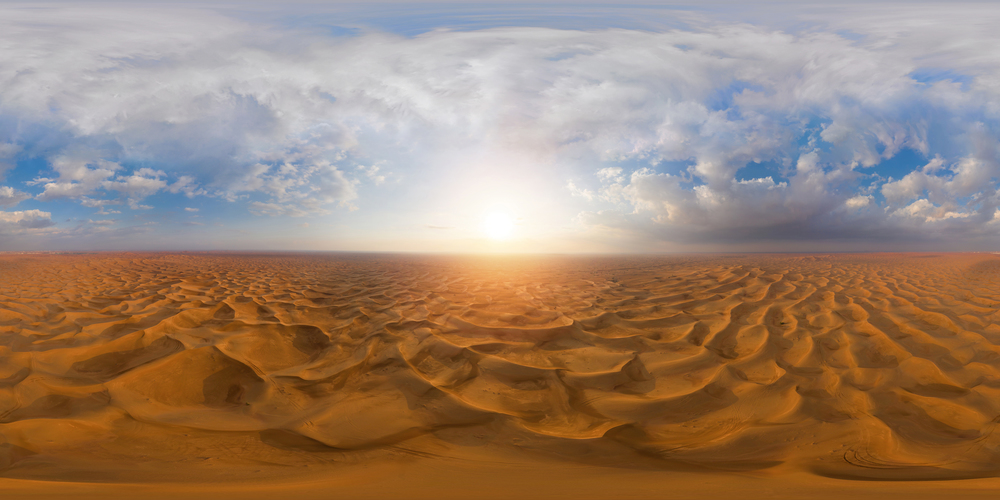 360 panorama by 180 degrees angle seamless panorama of aerial view of red Desert Safari with sand dune in Dubai City, United Arab Emirates. Natural landscape background at sunset.