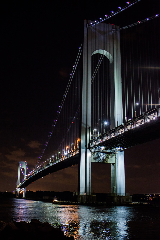 Verrazano bridge at night close up in New York. Verrazano bridge