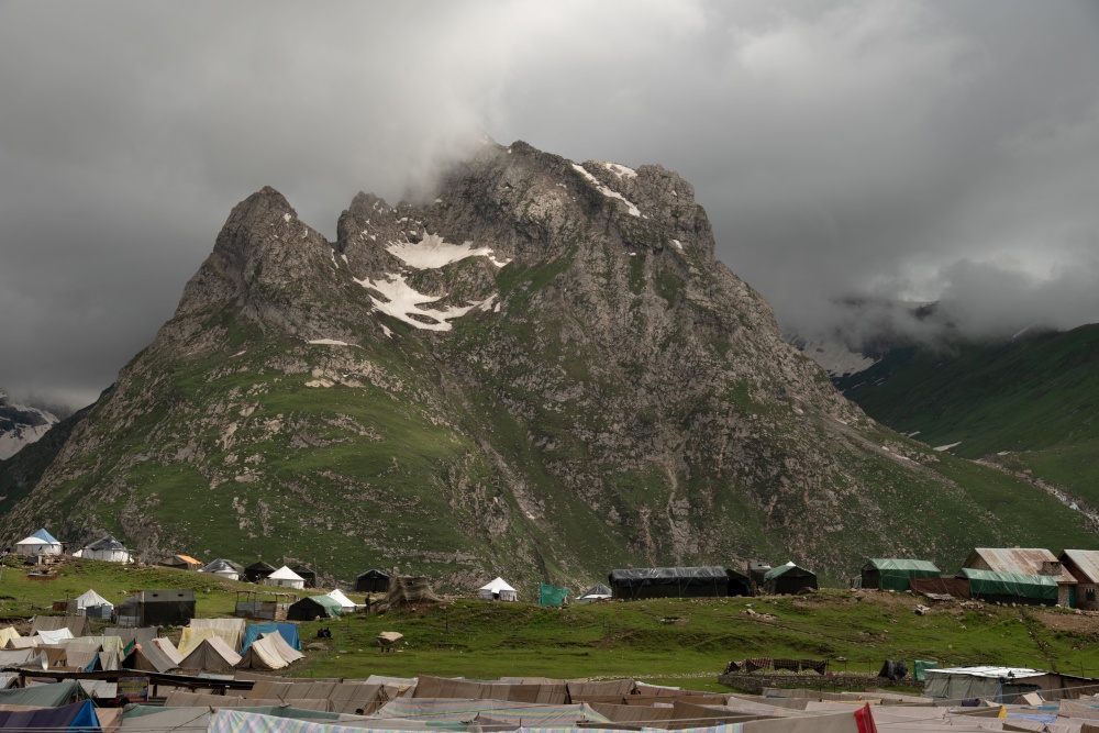 Tents pitched at Tisu Top with mountain in background, Jammu and Kashmir, India
