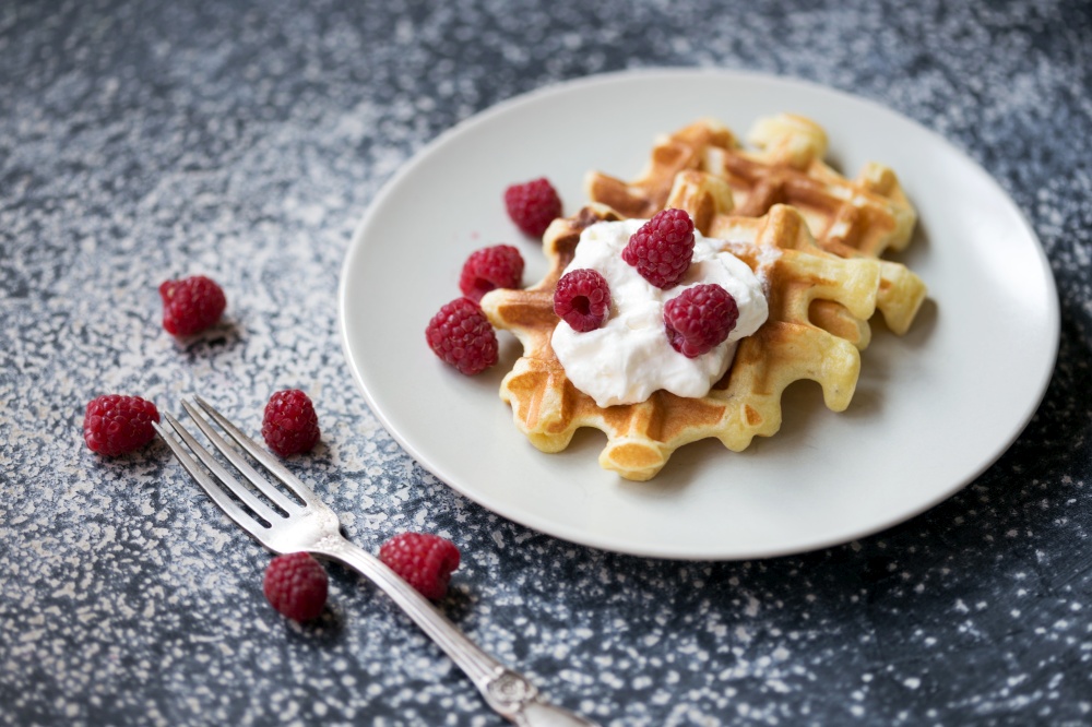tasty breakfast - Belgian waffles with raspberries