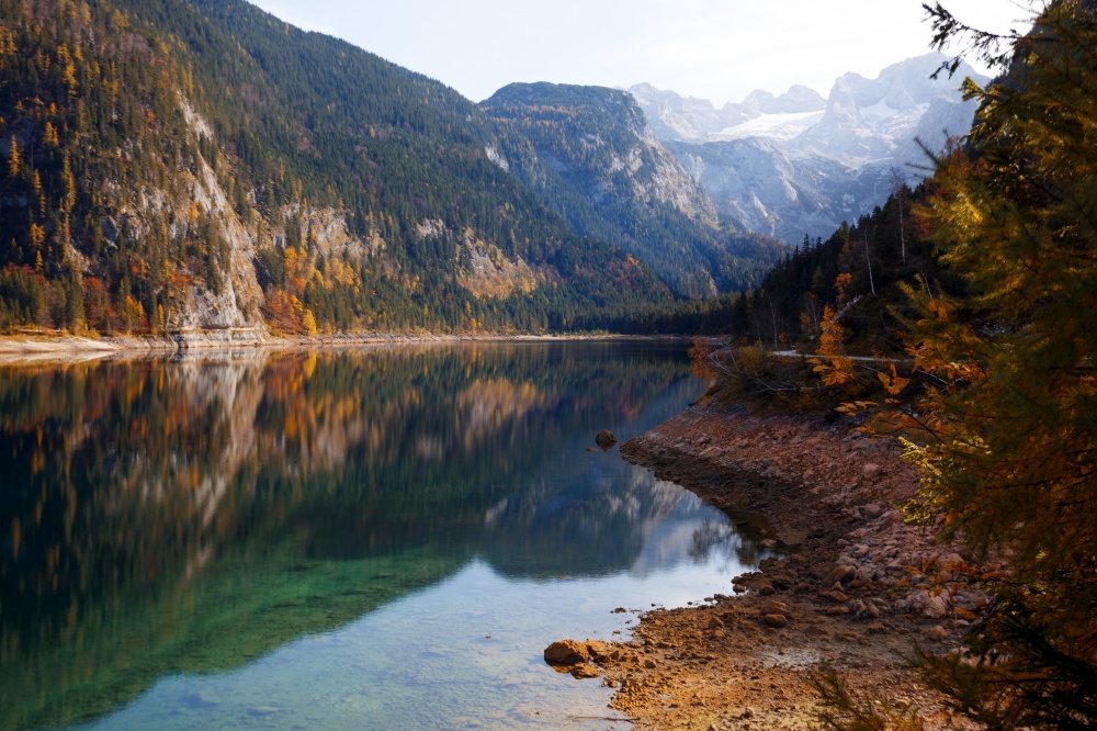 landscape with a beautiful mountain lake with reflection. Autumn. Hinterer Gosausee
