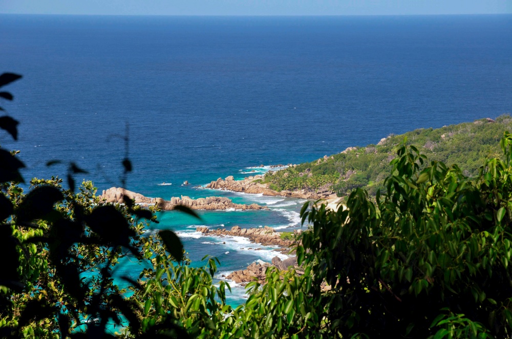 Elevated view of the La Digue Island coastline withe the bay in front of Petite Anse. Seychelles