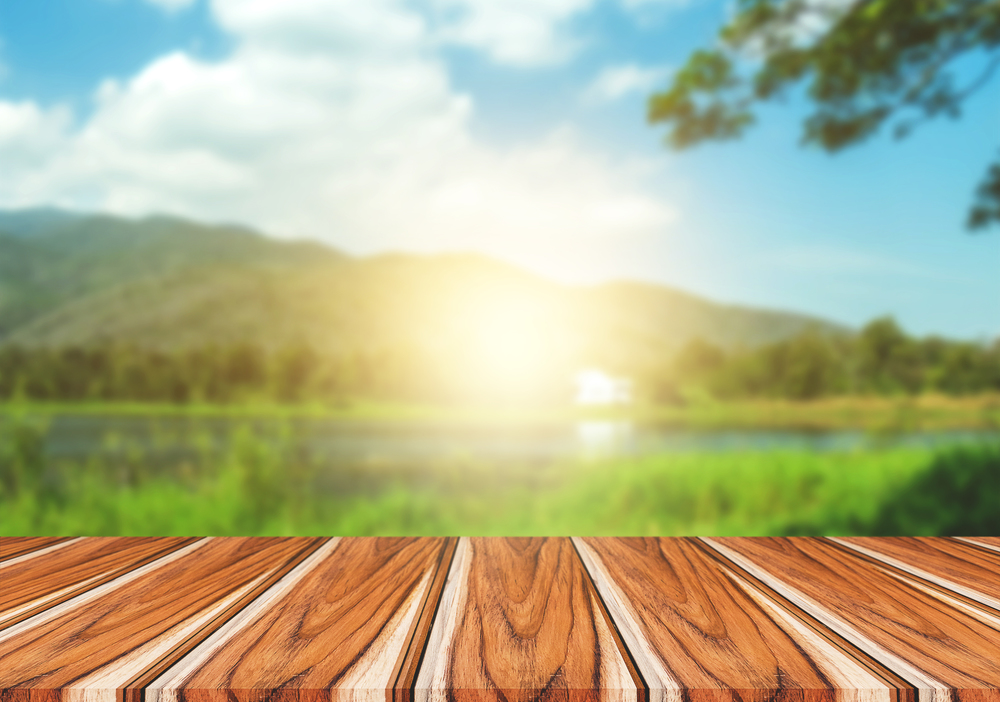 Selected focus empty brown wooden table and outdoors or nature blur background image. for your photomontage or product display.