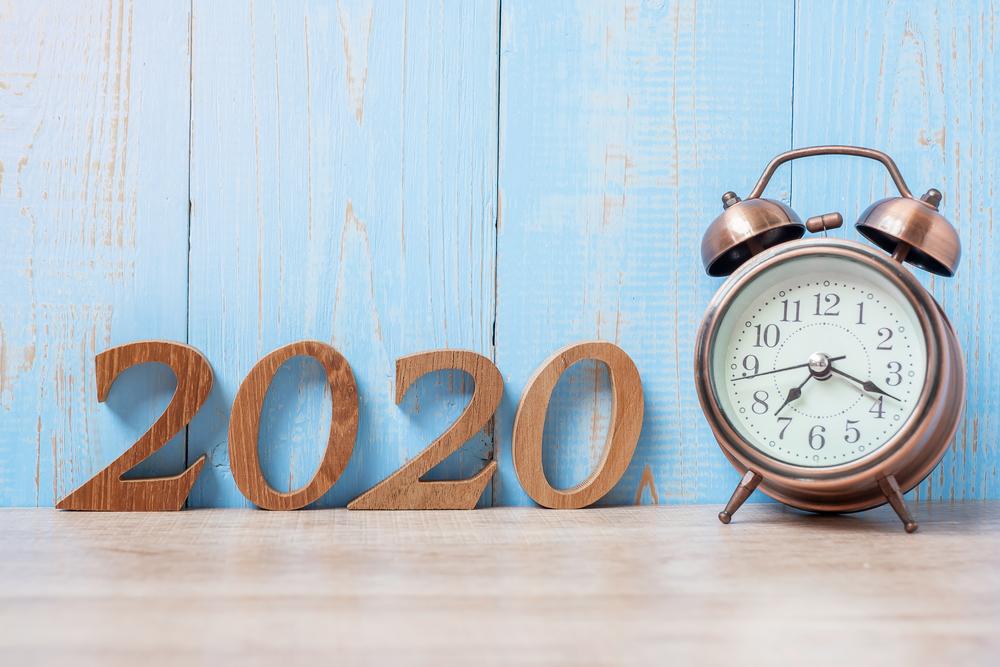 2020 Happy New Year  with retro alarm clock and wooden number. New Start, Resolution, Goals, Plan, Action and Mission Concept