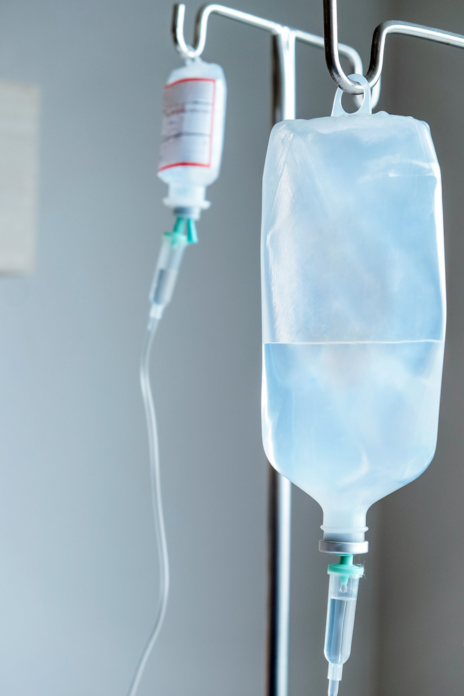 Medical Care,Close up of IV saline solution drip for patient in hospital