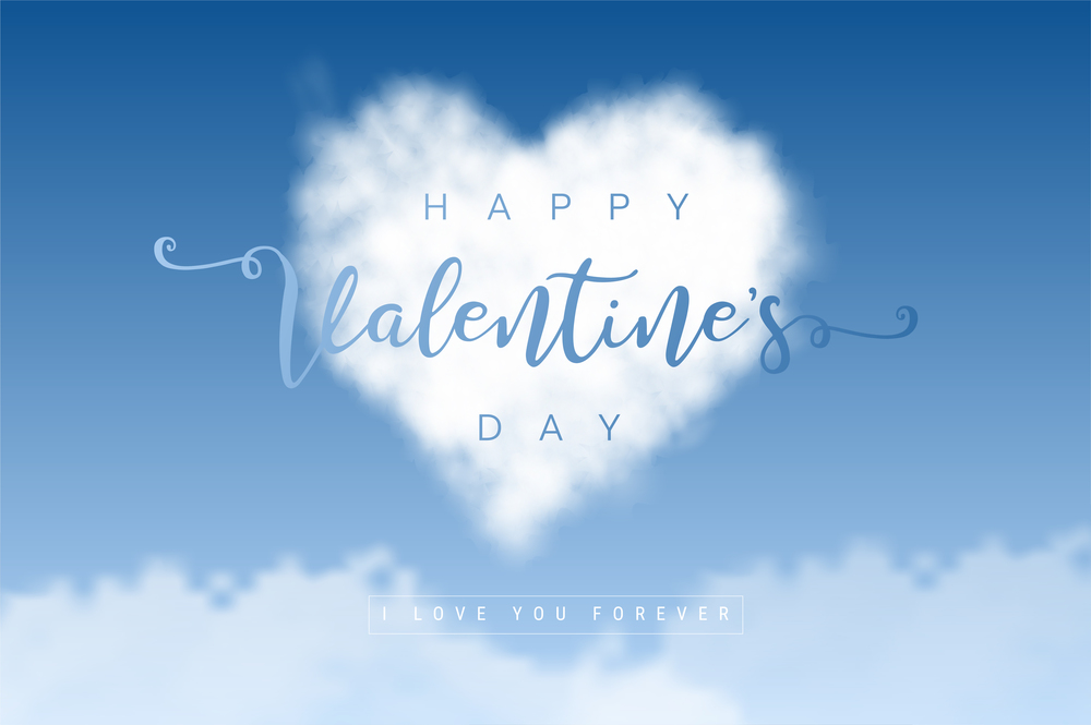 heart shaped clouds in the blue sky. Love and valentine concept.