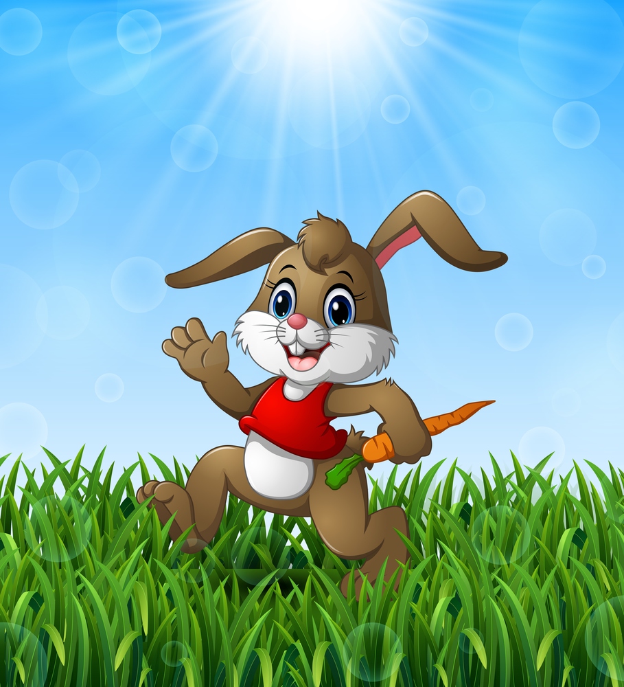 Funny rabbit cartoon holding a carrot in the grass on a background of bright sunshine