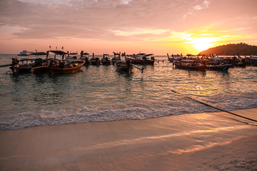 Beautiful sunset long-tail boat Koh Lipe Beach Thailand ,Summer vacation