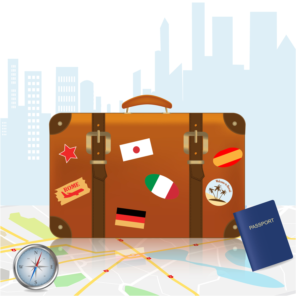 Travel suitcases, International passport and Compass on the map background.