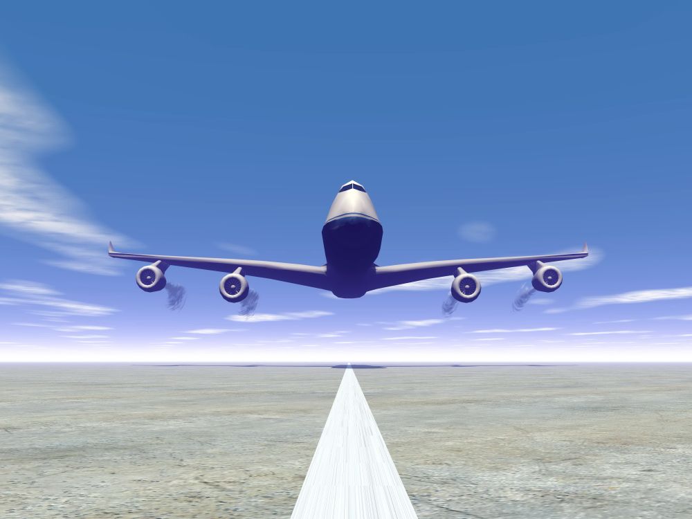 Frontview of a airplane landing on the ground by day. Plane landing - 3D render