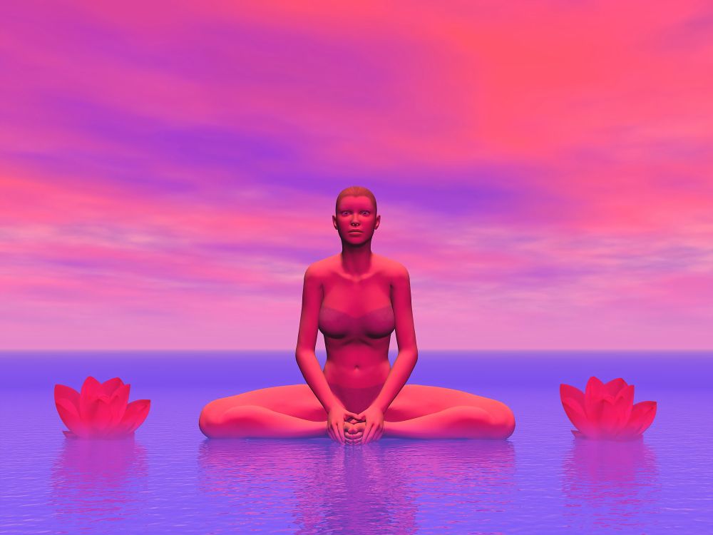 Woman sitting in yoga posture with two lotus flowers aside in pink background