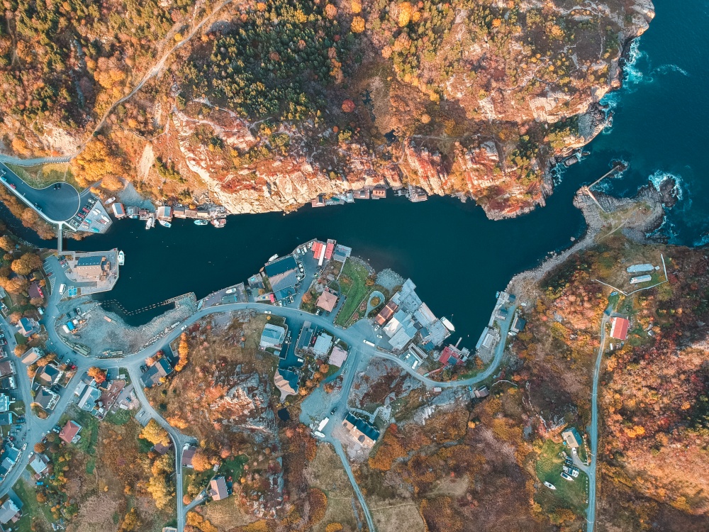 aerial view of body of water between buildings