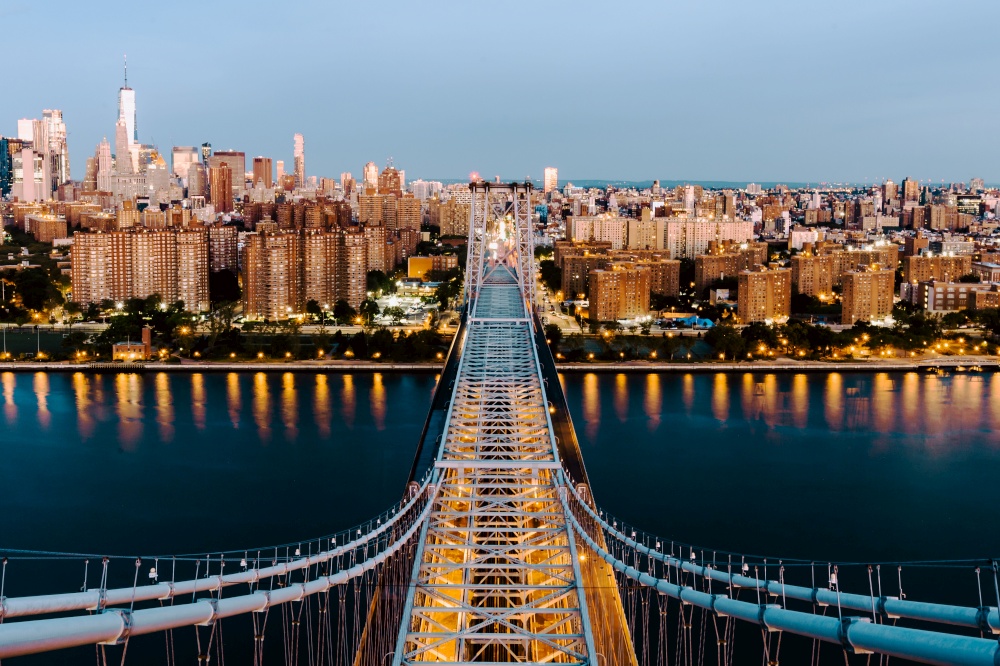An aerial shot of the Queensboro Bridge and the buildings in New York City, United States. Aerial shot of the Queensboro Bridge and the buildings in New York City, United States