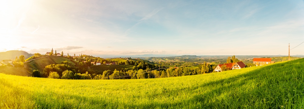 Autumn Landscape panorama of vineyard on an Austrian countryside during sunset in Kitzeck im Sausal. Tourist destination. Autumn Landscape panorama of vineyard on an Austrian countryside during sunset in Kitzeck im Sausal