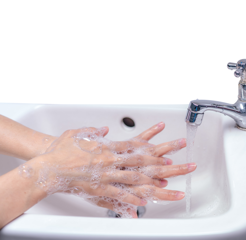 Woman washing hand with soap foam and tap water in bathroom. Hand clean under faucet on sink for personal hygiene to prevent flu and coronavirus. Good procedure of hand wash to kill bacteria, virus.