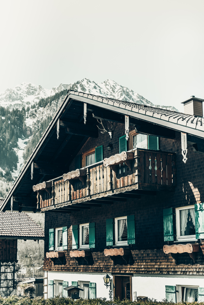 Beautiful view of traditional wooden house in the Bavarian Alps, Germany. Traditional wooden house