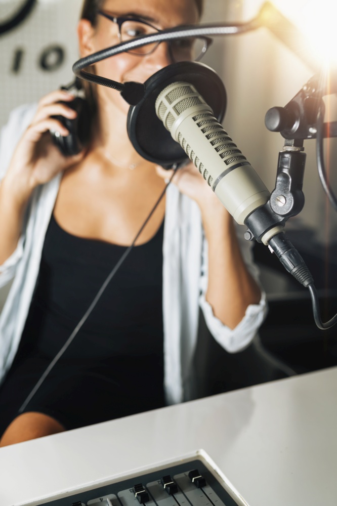 Live broadcasting of a podcast or online radio talk show from a studio. Live broadcasting of a podcast or online radio talk show