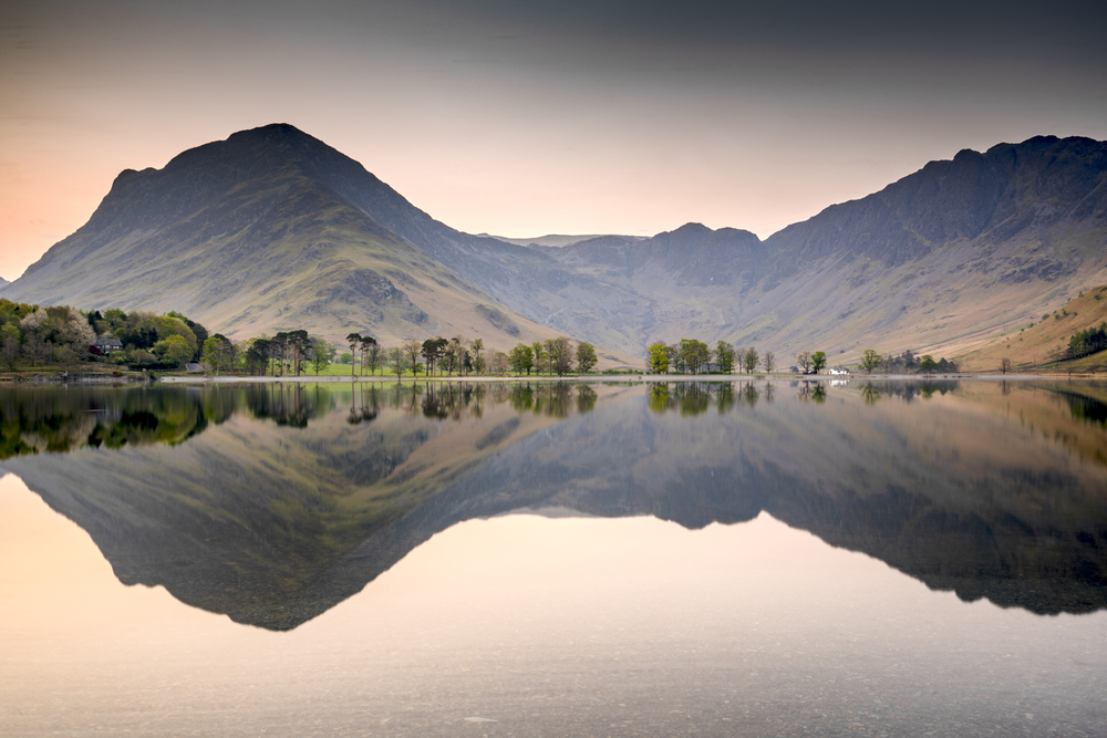 Dawn around Buttermere, the lake in the English Lake District in North West England. The adjacent village of Buttermere takes its name from the lake.