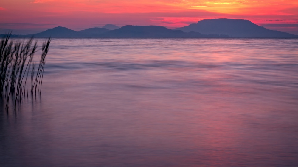 Beautiful sunrise over the lake Balaton of Hungary, long exposure