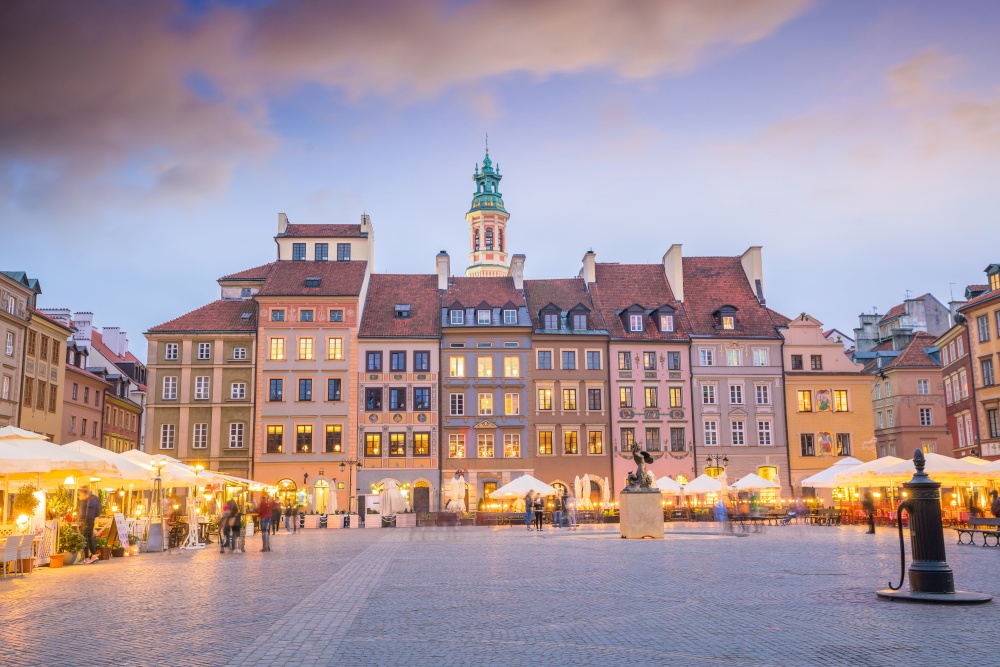 Old town square in Warsaw, Poland at sunset