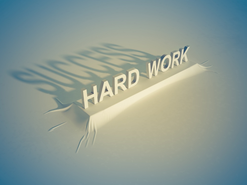 A 3d word " HARD WORK " which have shadow " SUCCESS "