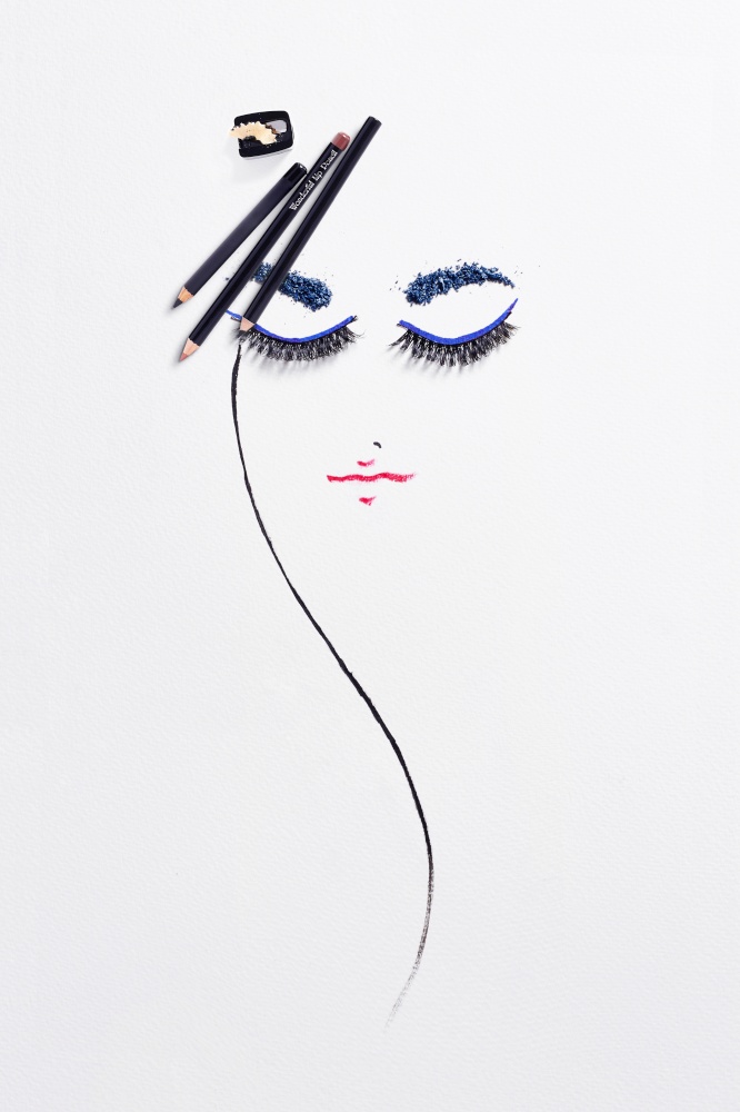 Drawing with make up products on paper.