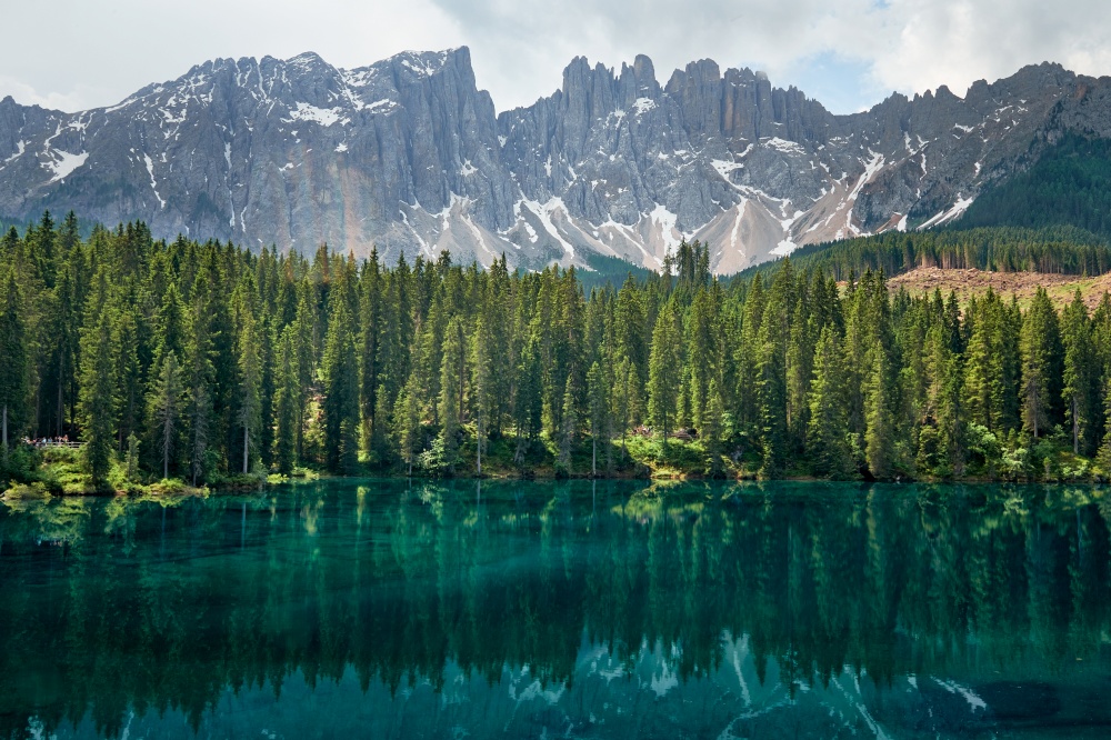 Landscape of Carezza Lake, a small alpine lake in the Dolomites in South Tyrol, Italy