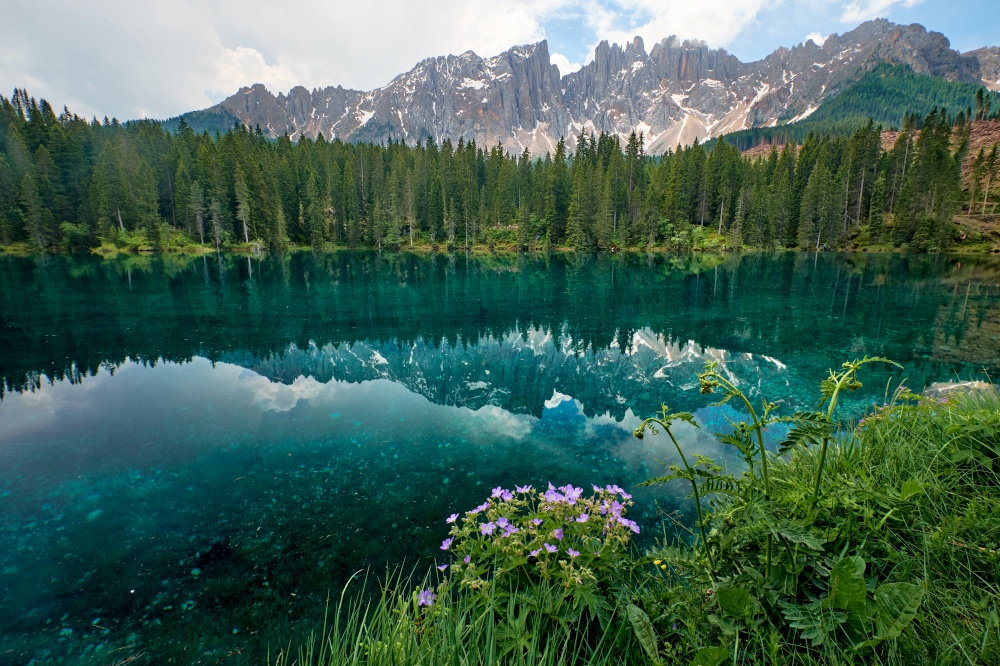 Landscape of Carezza Lake, a small alpine lake in the Dolomites in South Tyrol, Italy