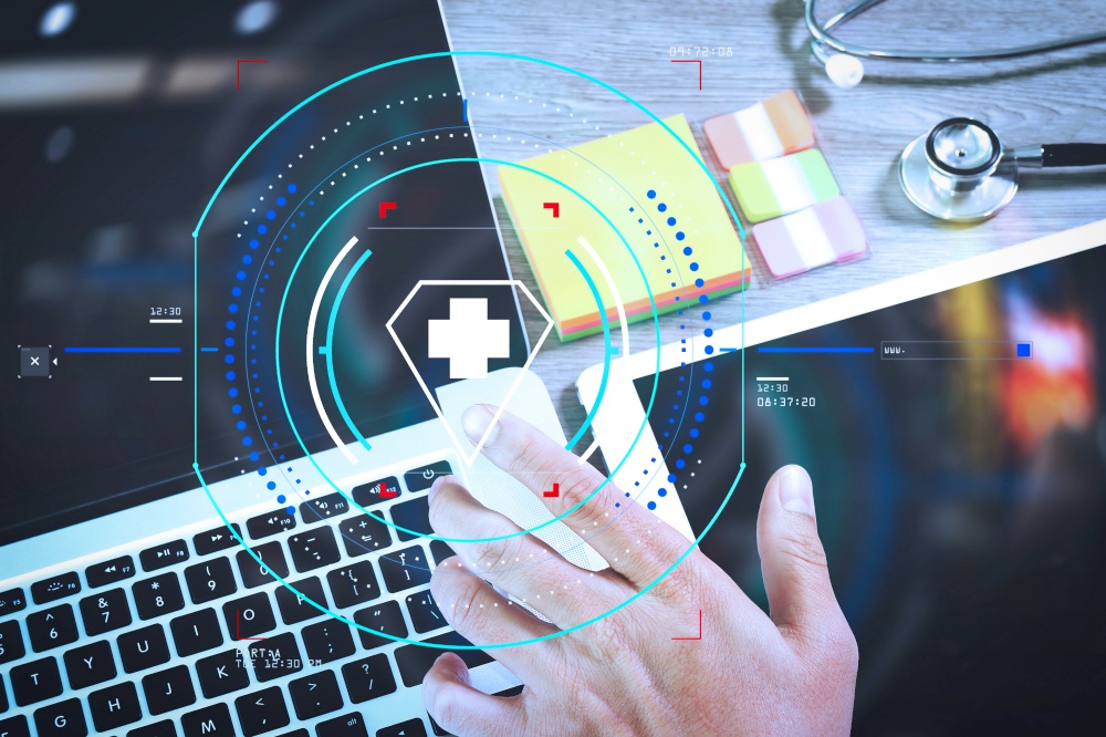 Health care and medical services with circular AR diagram.Medical network technology concept. Doctor hand working with stethoscope and laptop computer digital tablet